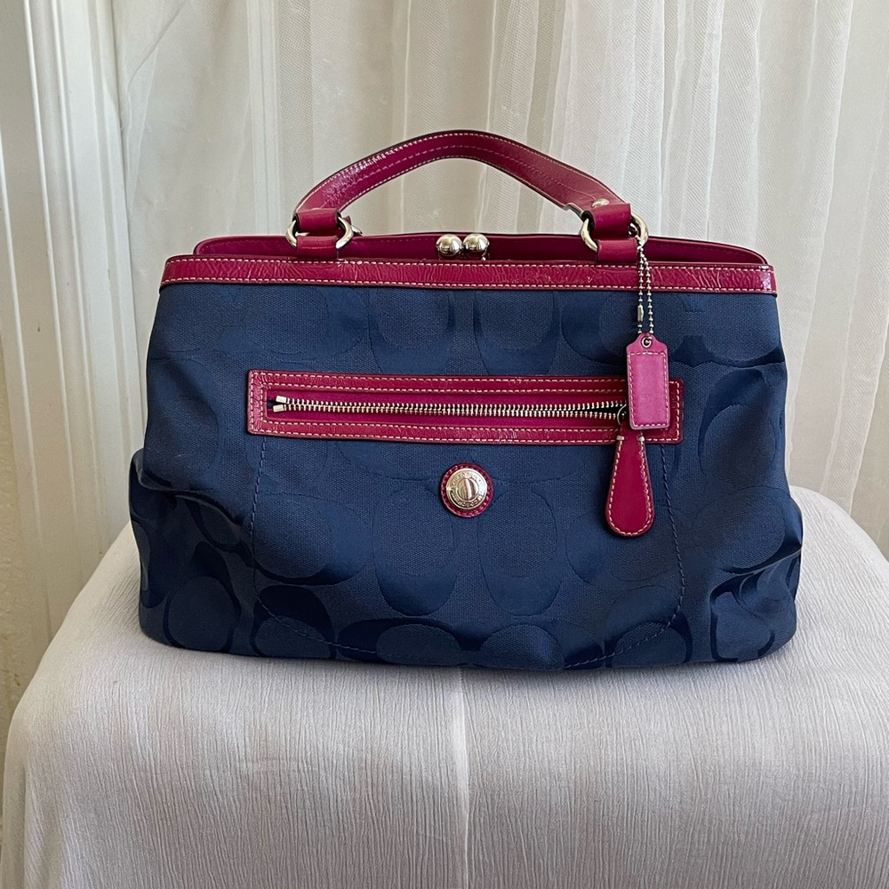 Coach Navy and Pink Satchel. Kiss clutch pocket detail